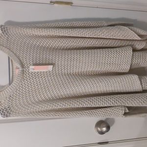 Poncho with sparkle thread